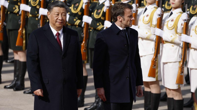 Emmanuel Macron stands with  China's Xi Jinping — amid puppet accusations
