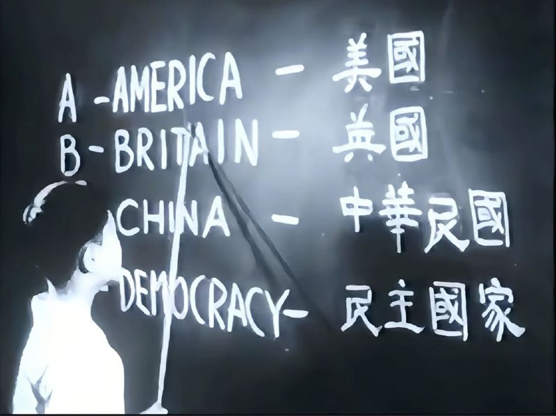 看到这张老照片里的两